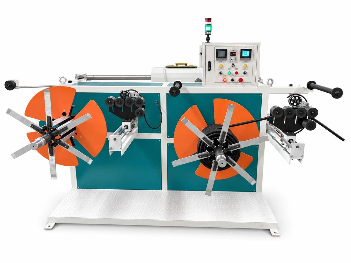 Single-wall corrugated pipe coiler with two orange winding reels and a teal-and-white central control cabinet